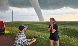 Storm Chasers Get Engaged In Front Of Tornado